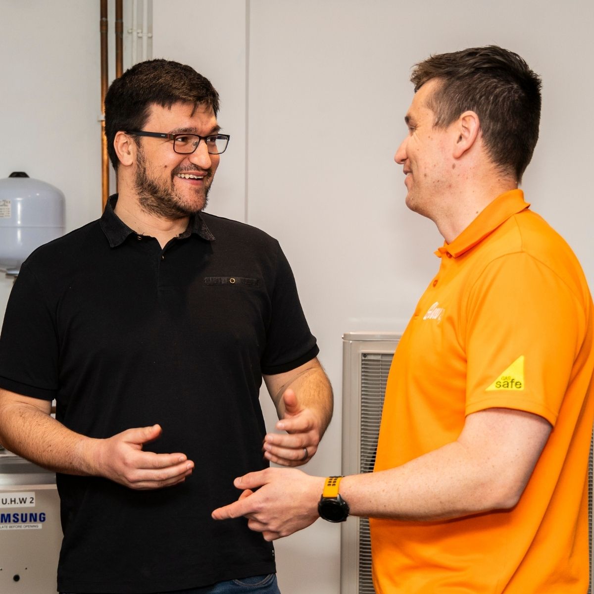 Team photos for The Glow Group, Lincolnshire - the Managing Director chatting with a client