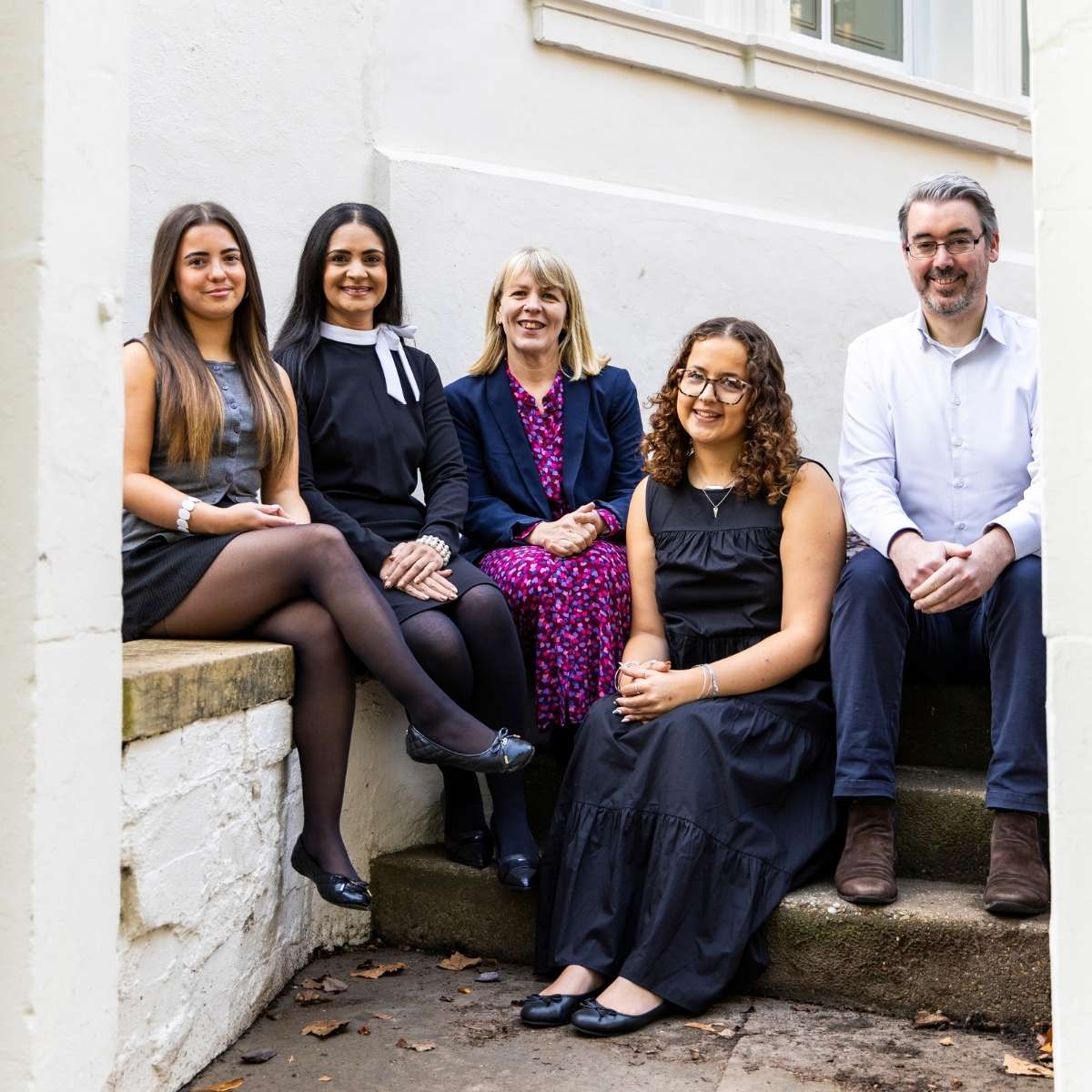 Team Photos with Devello Group, Nottingham - the team sat on steps